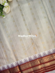 KANCHI BUTTA CHECKS BORDER SAREE CREAM RED