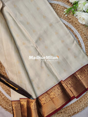 KANCHI CHECKS BUTTA BORDER SAREE CREAM RED